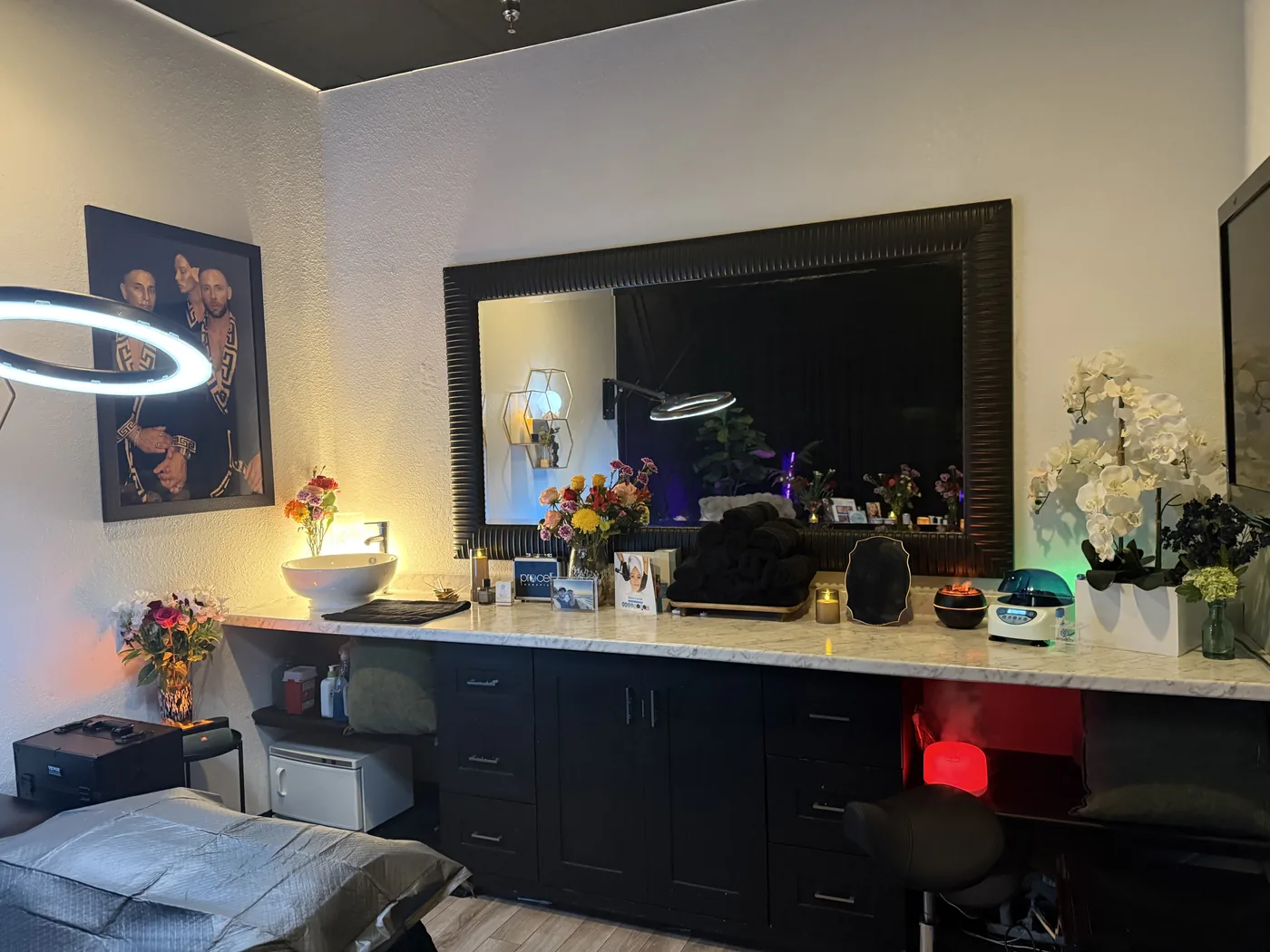 Treatment room with vanity, mirror and styling chair